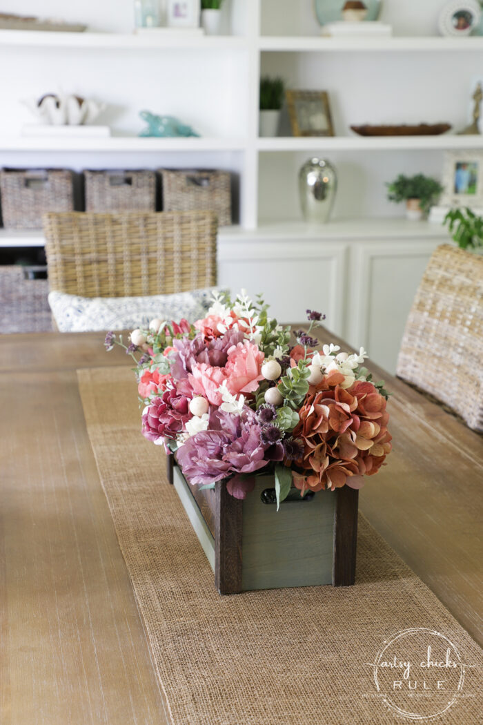 Using an old thrifty find, plus fall florals from the store, make this non tradtional fall floral centerpiece simply! artsychicksrule.com #fallfloralcenterpiece #fallflowers