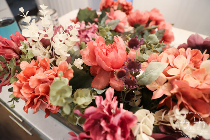 Using an old thrifty find, plus fall florals from the store, make this non tradtional fall floral centerpiece simply! artsychicksrule.com #fallfloralcenterpiece #fallflowers