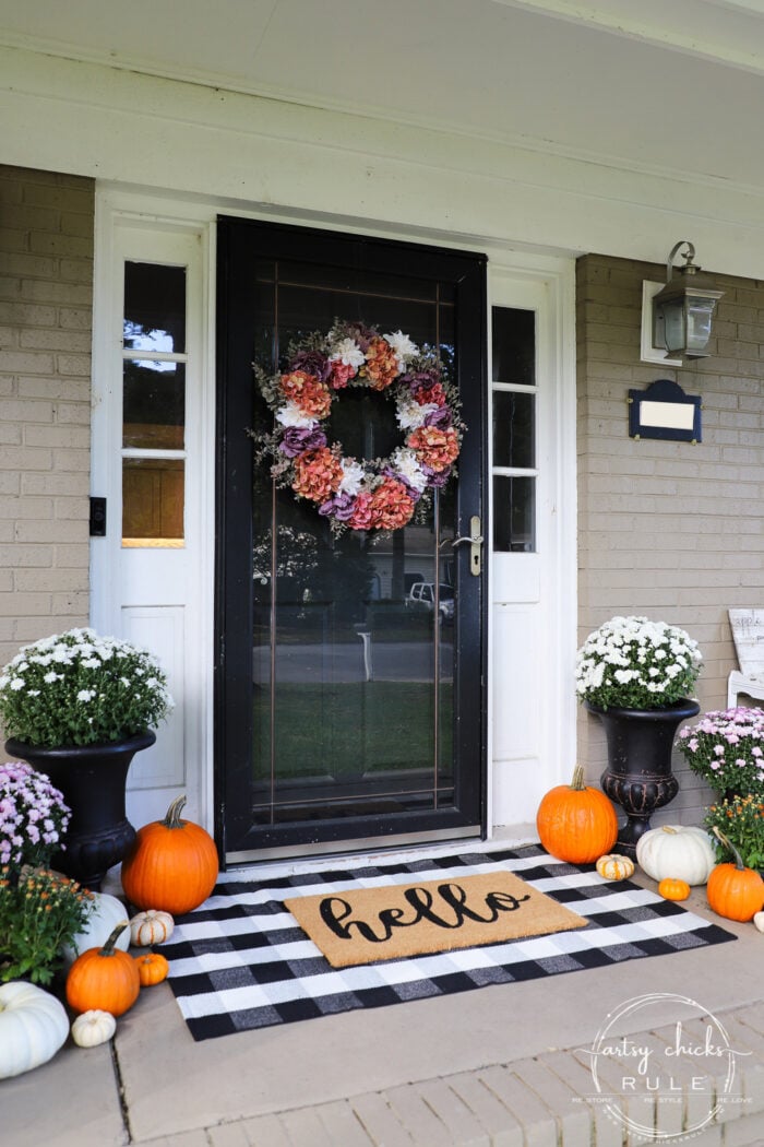 Fall front porch with plum, ivory and orange! Tradtional and a bit of non-traditional too! artsychicksrule.com #fallfrontporch #fallporch