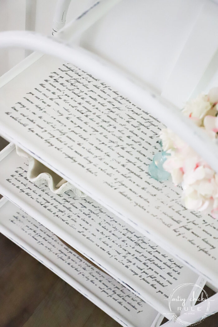 top view of white shelf with script furniture transfer