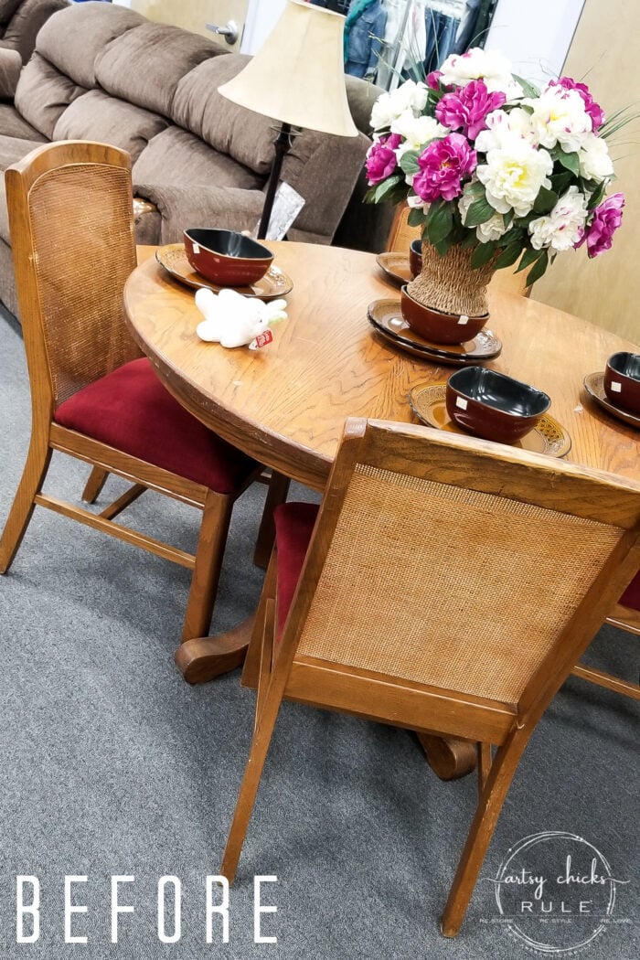 orangey wood table with chairs