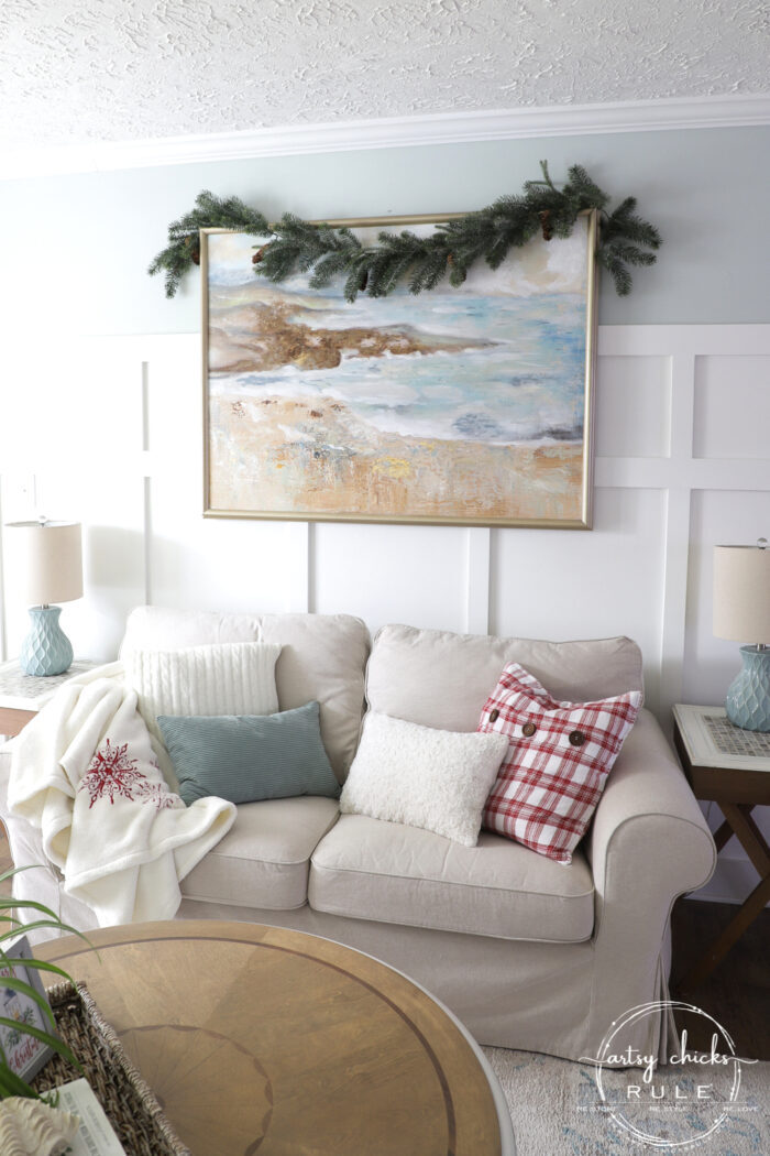 Create a cozy Christmas living room (and home) with sweet, sentimental touches, pops of red, cozy throws, and pillows! artsychicksrule.com