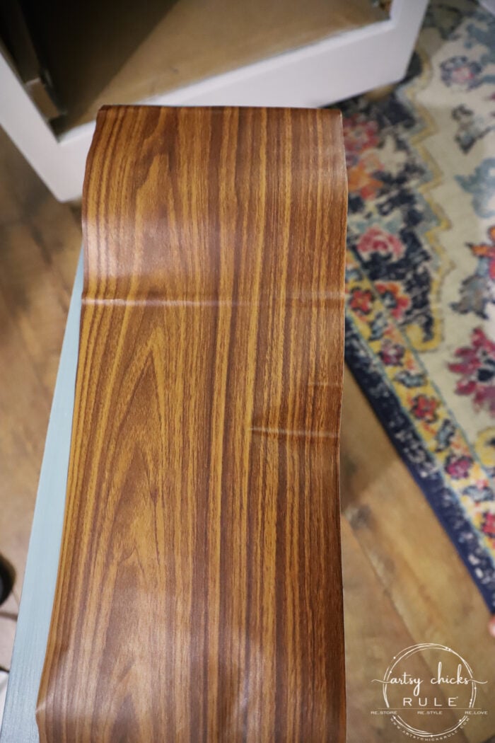 Realistic wood grain vinyl for furniture makeovers...well yes! What a fun way to update your old furniture! artsychicksrule.com 