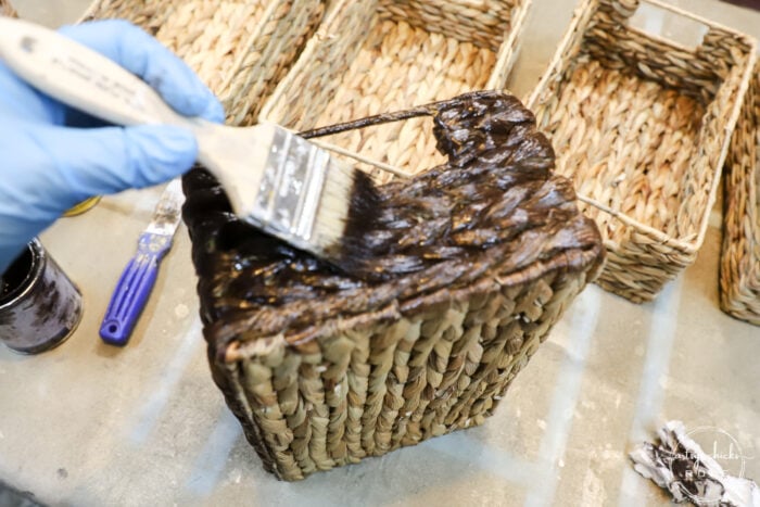 brushing on gel stain onto basket