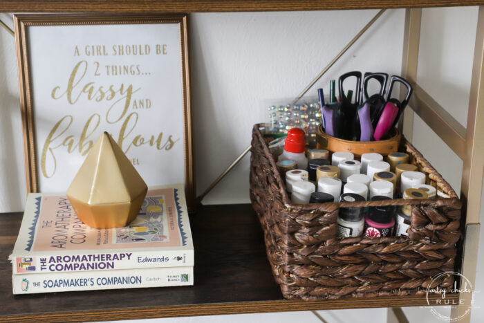 gold decor with books and craft paint basket