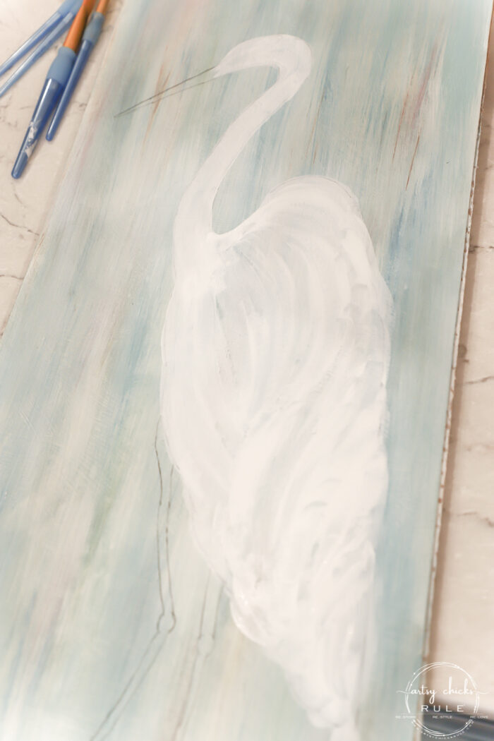 blue heron painted white
