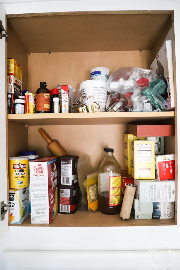 baking cabinet with cookie making items