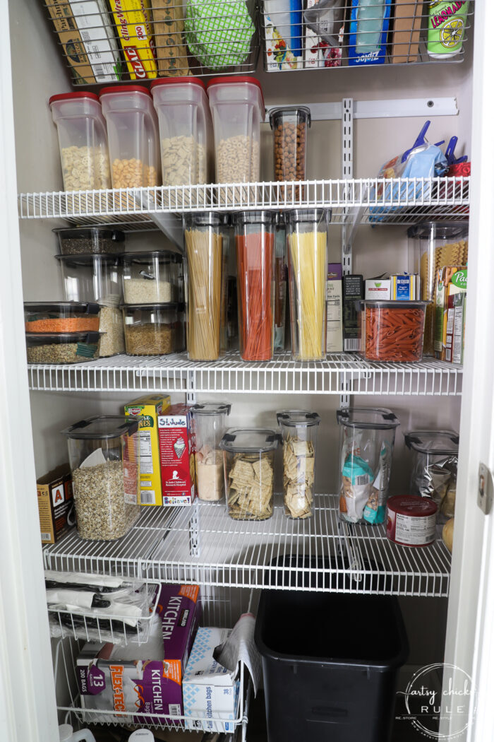 Pantry shelves with storage containers 