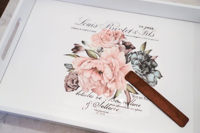 white tray with rose transfer being transferred