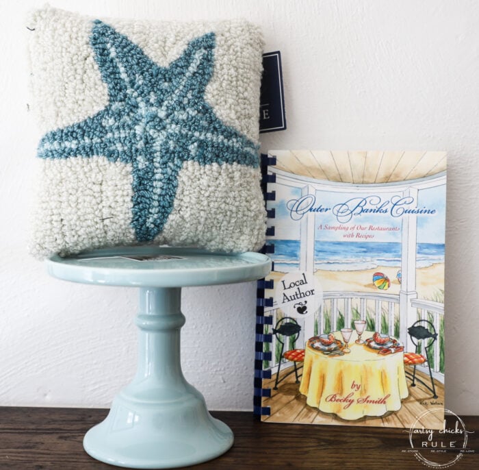 blue and white starfish mini pillow, blue cake platter and beach cookbook