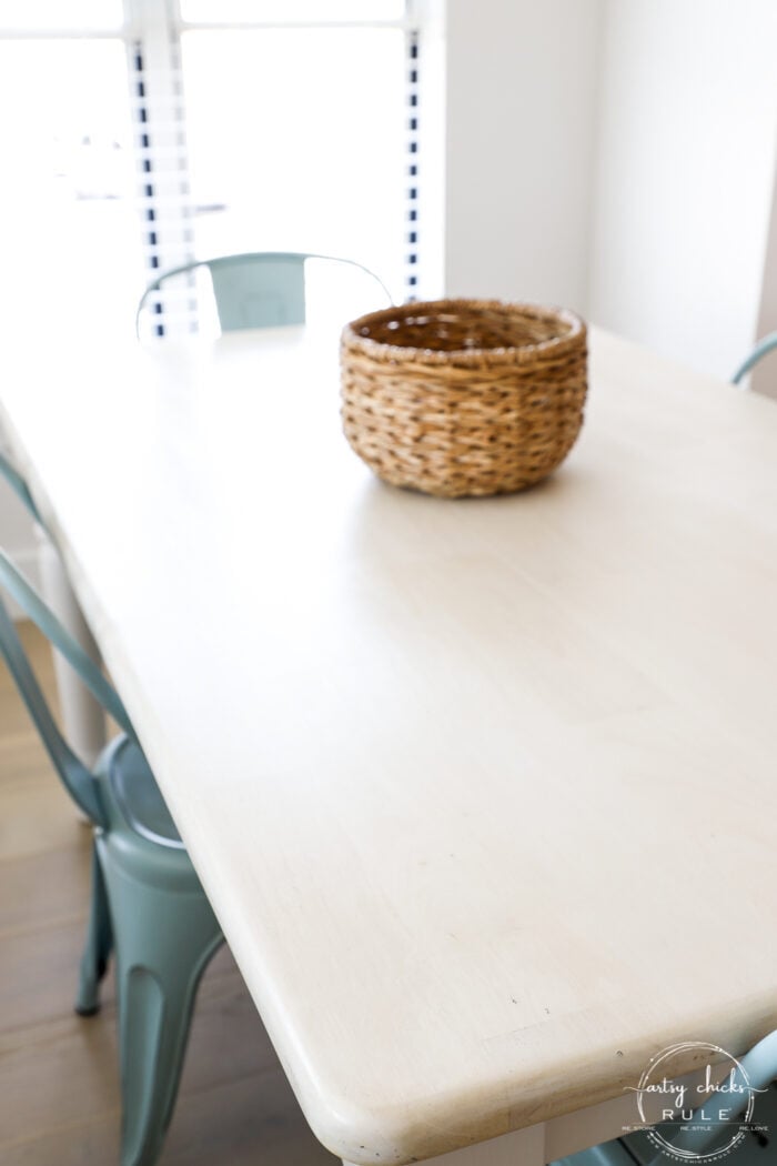 close up view of bleached wood table and basket