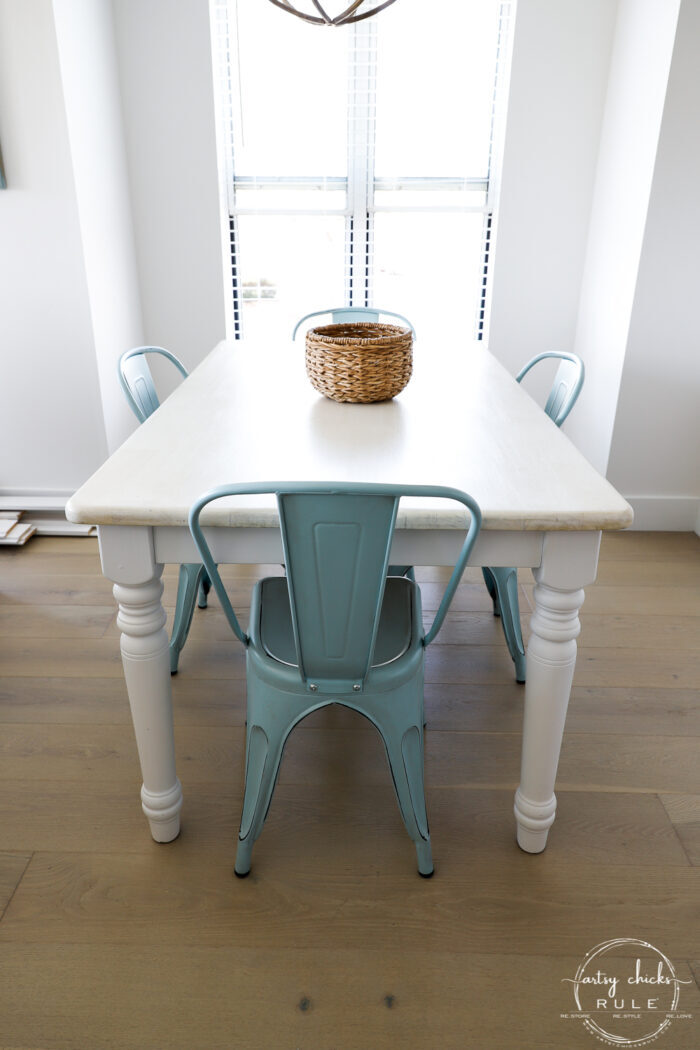 table and blue chairs