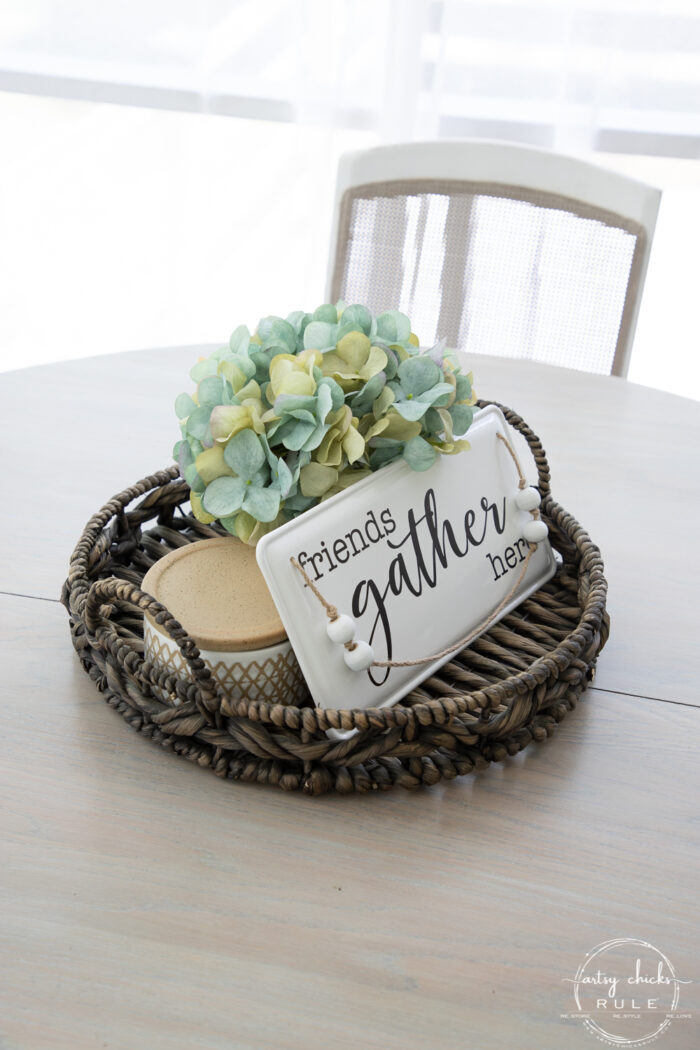 basket centerpiece with aqua hydrangea and white/black gather sign