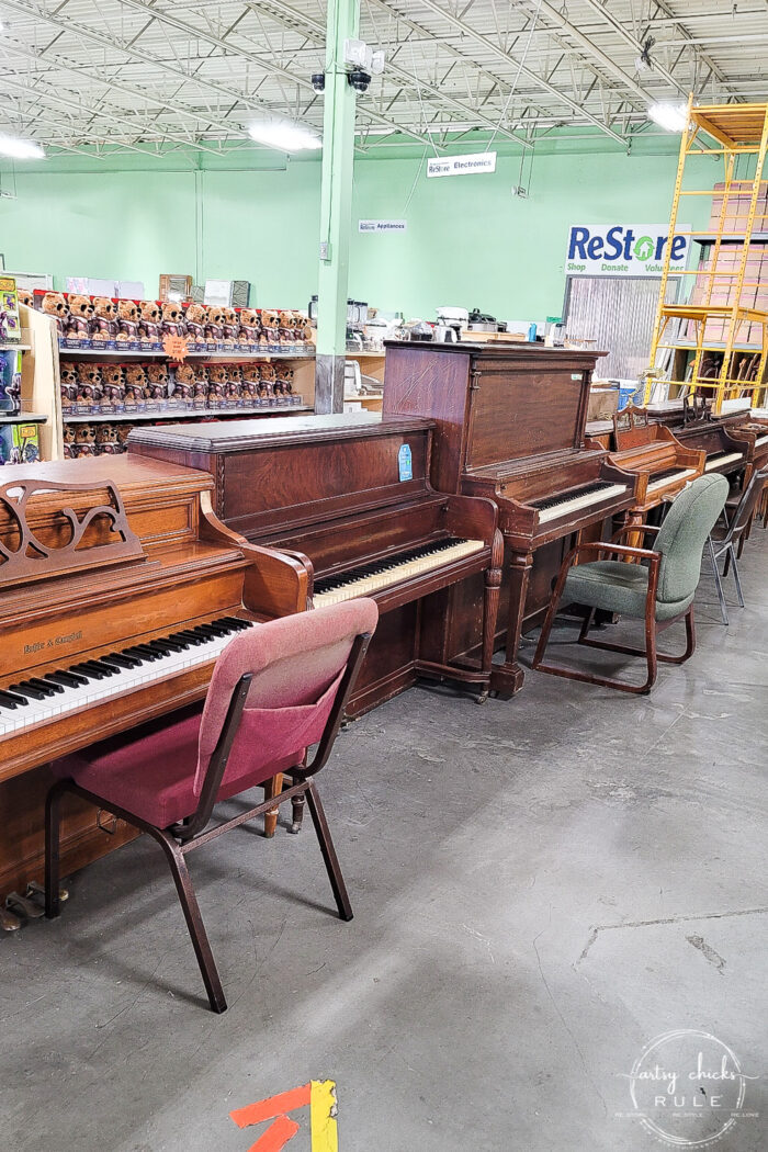 row of pianos