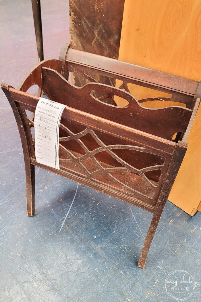 scrolled cut wood magazine rack