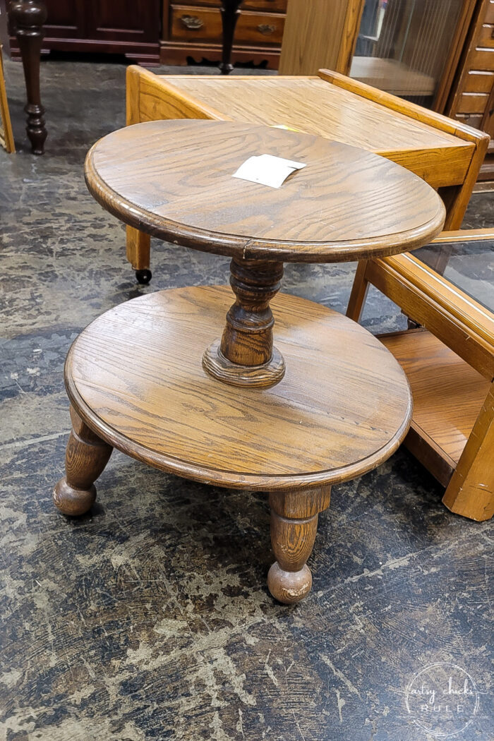 odd looking 2 shelf table round