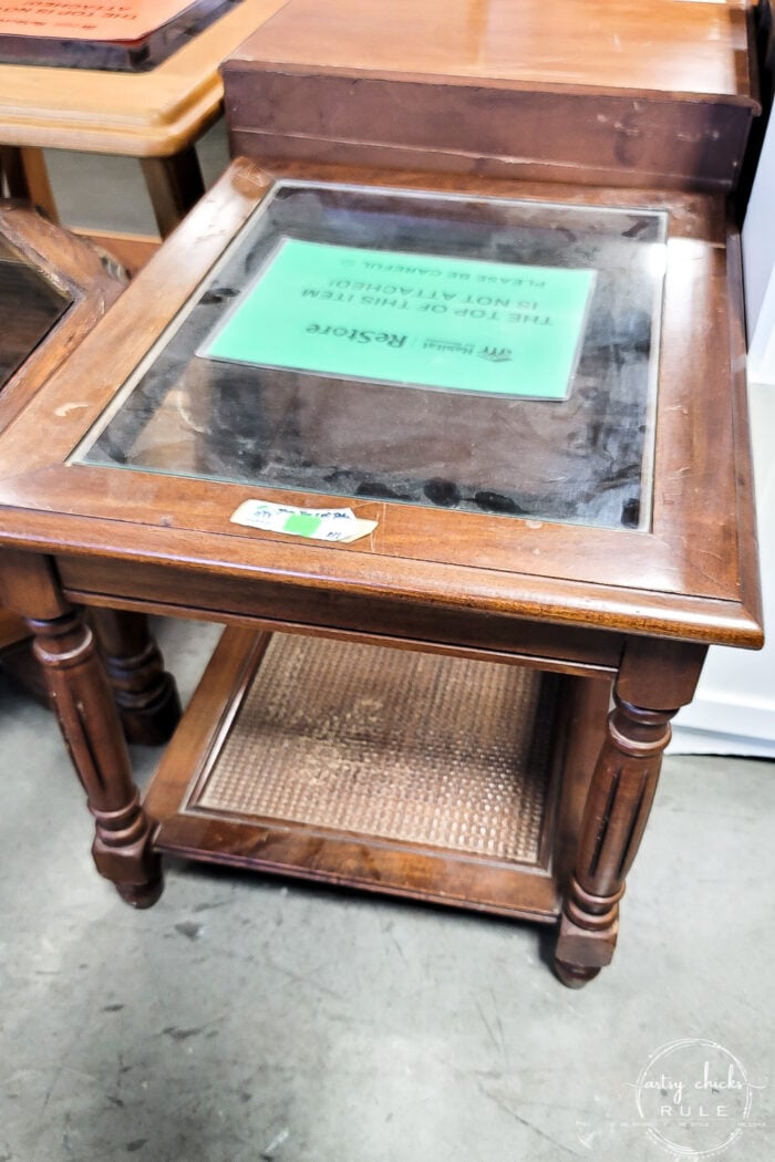 glass top wood end table with cane shelf