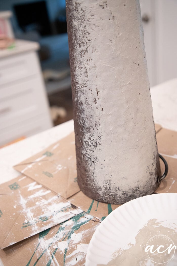 painting the fiber paste on lamp