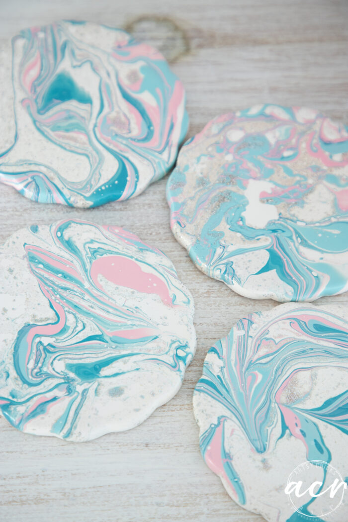 close up top view of pink and blue coasters
