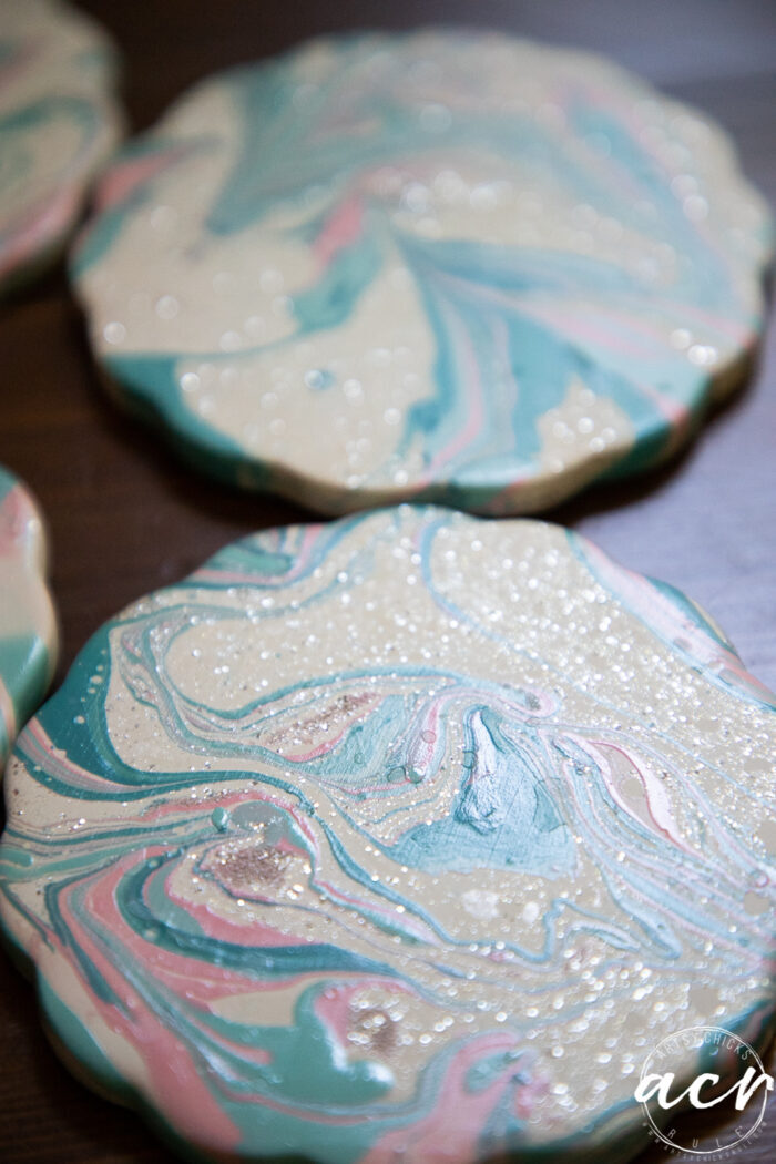 side view showing sparkles on coasters