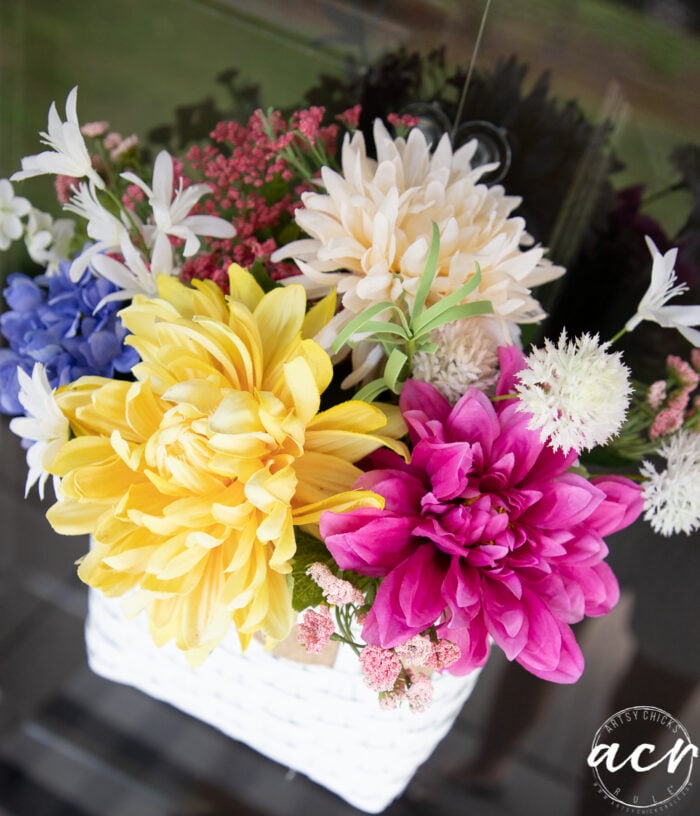 top view of basket with colorful flowers