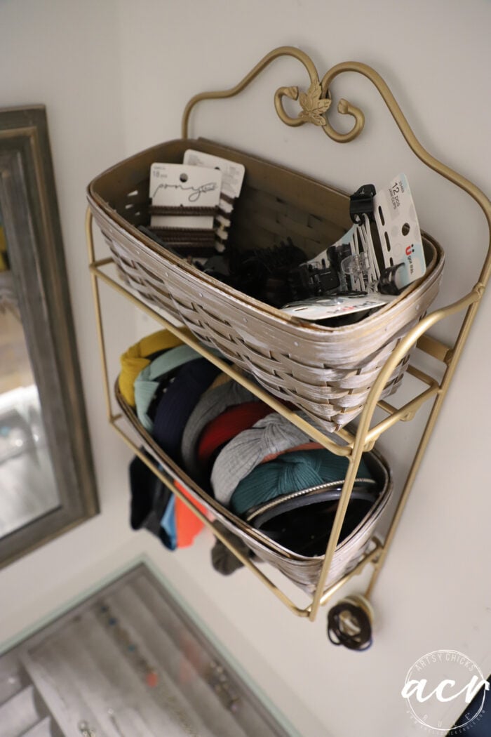 showing inside of baskets with headbands and hair ties