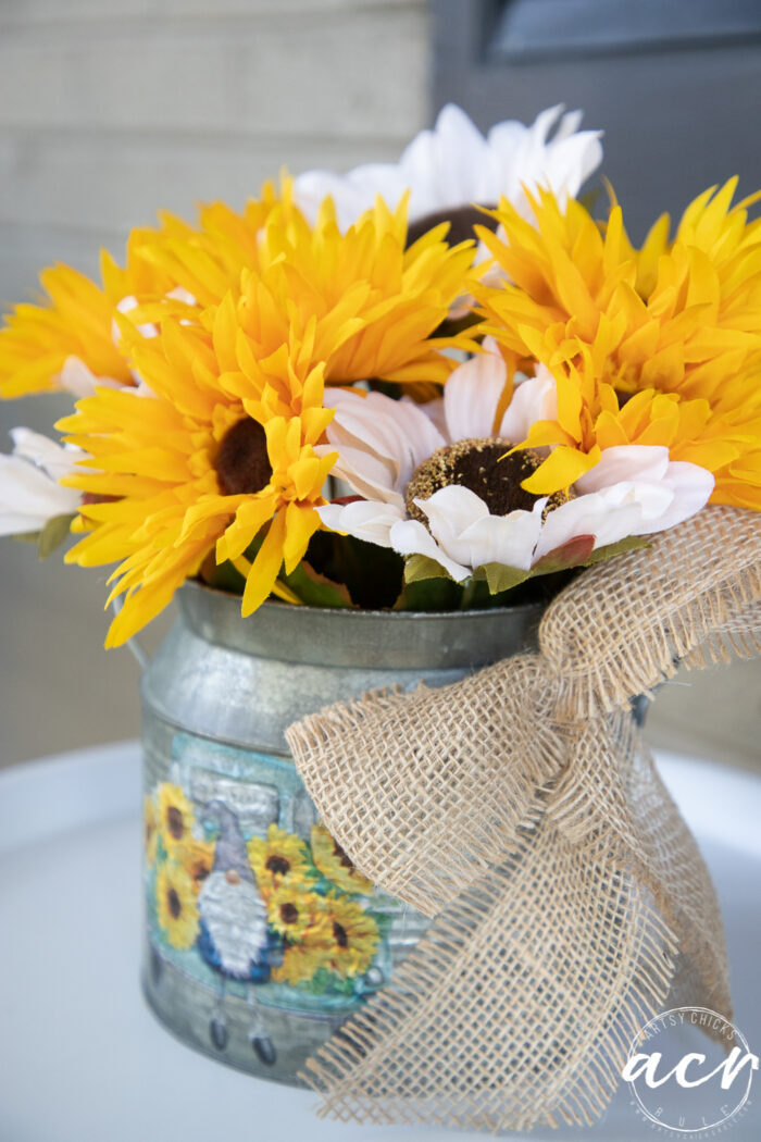 small tin with decoupaged napkin and sunflowers