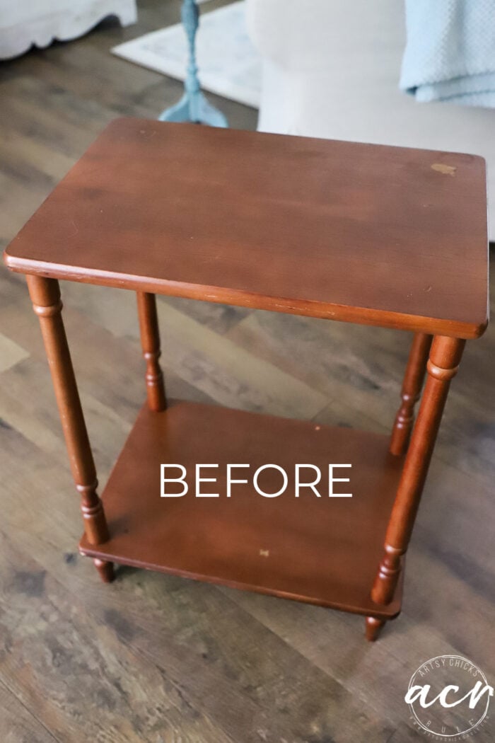 orangey red stained 2 level table before