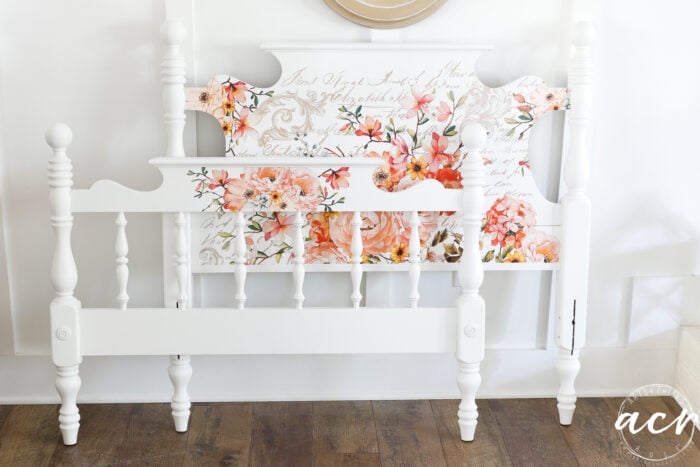 bed set with floral transfer on both against white wall