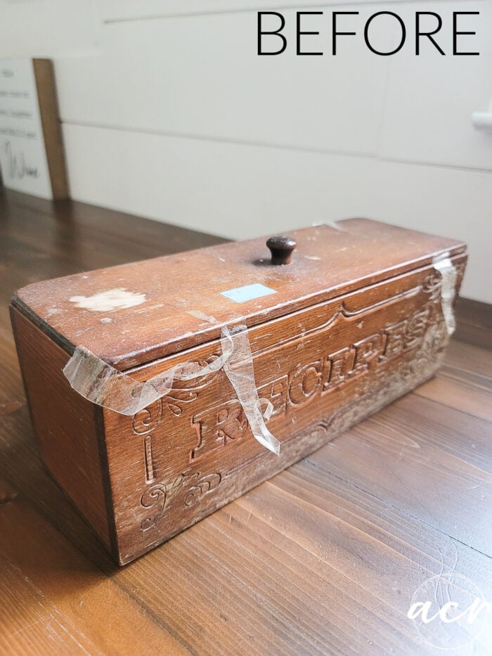 old wood recipe box sitting on wood countertop