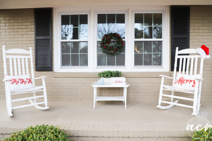 white rockers with red Christmas pillows