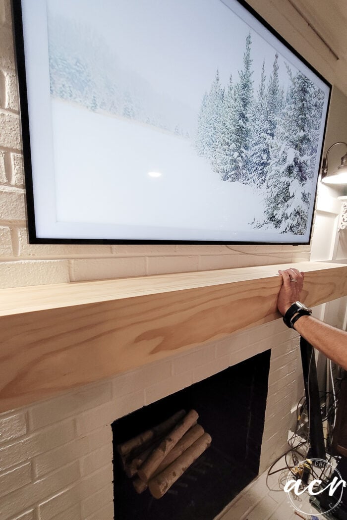 attaching new wood mantel to fireplace