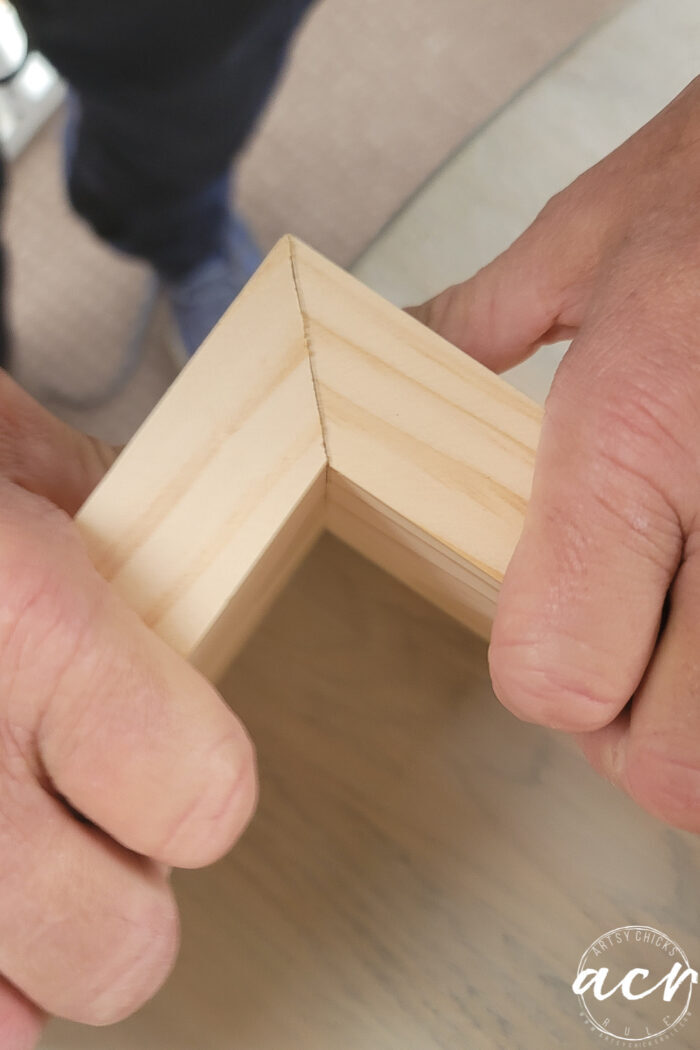 close up of two 45 degree boards cut for corner