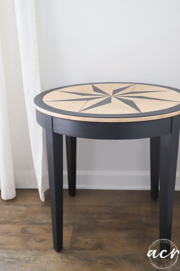 black and natural compass rose table side view 