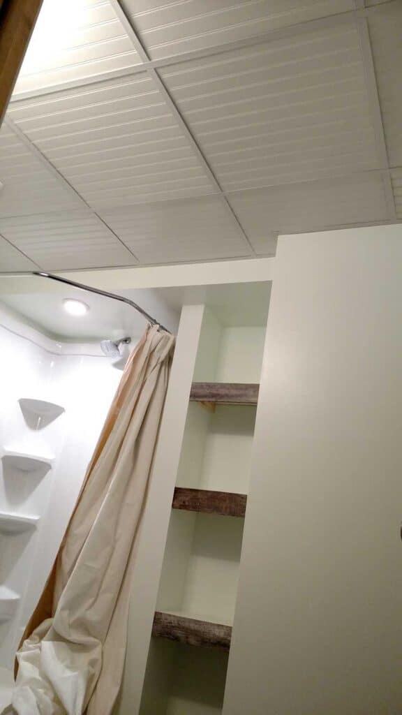 bathroom with white beadboard ceiling