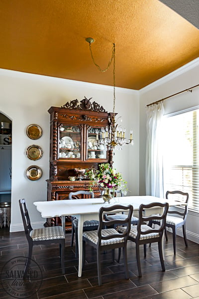 dining room with table and chairs and dark gold ceiling