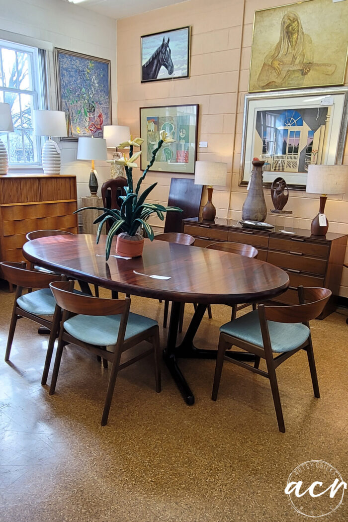 large oval dining set with mcm chairs teal seats
