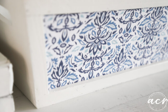 blue and white scrapbook paper on white box