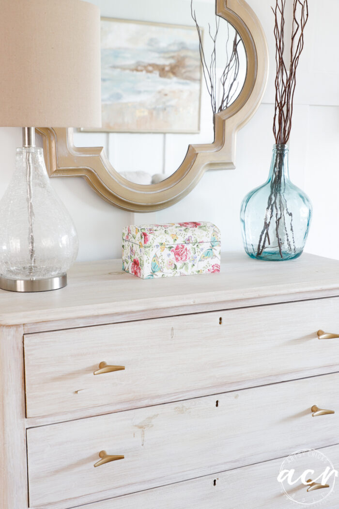 floral box on white dresser