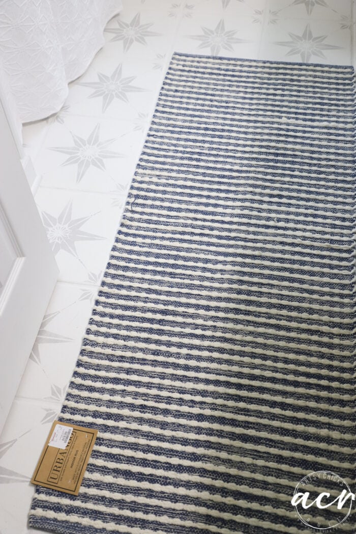 blue and white striped rug