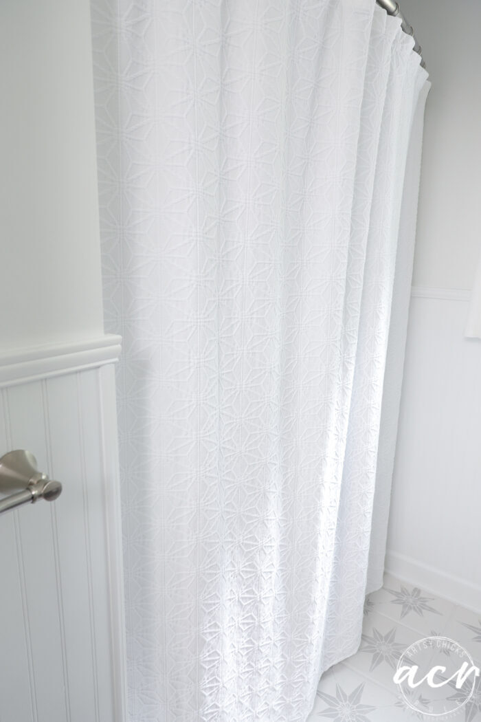 up close of star pattern on shower curtain