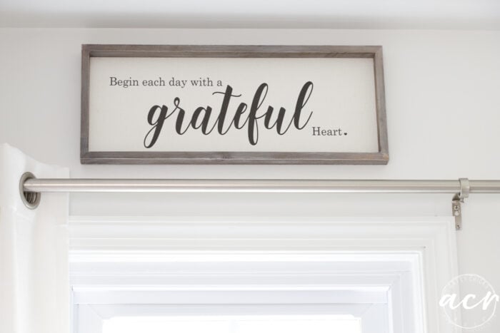 begin each day with a grateful heart sign over window