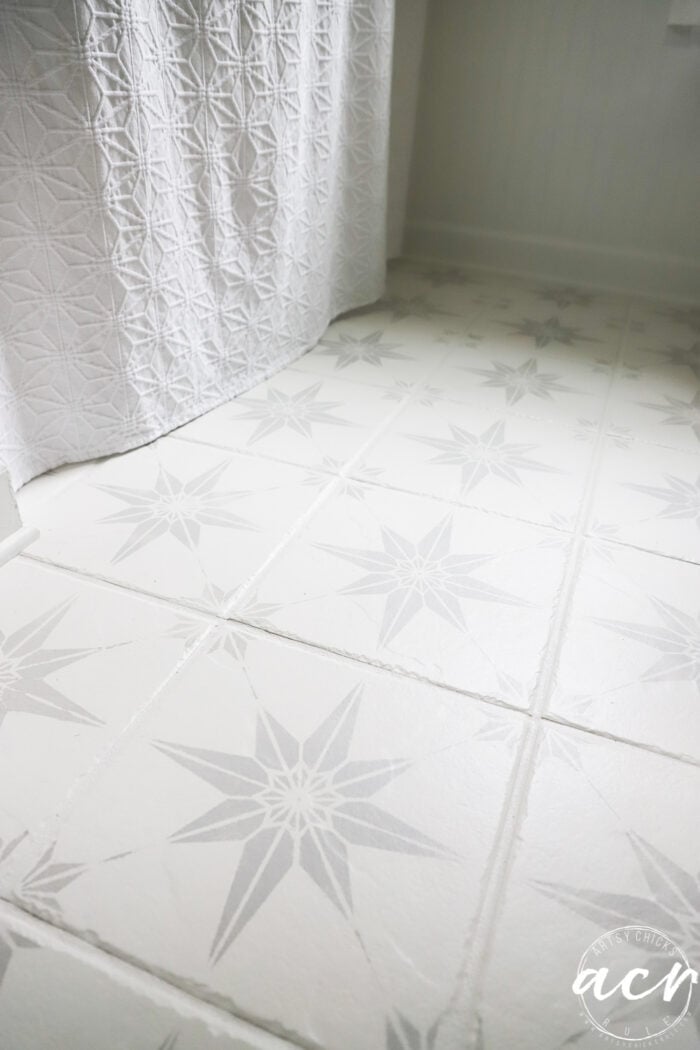 white tile floor with pale gray stars