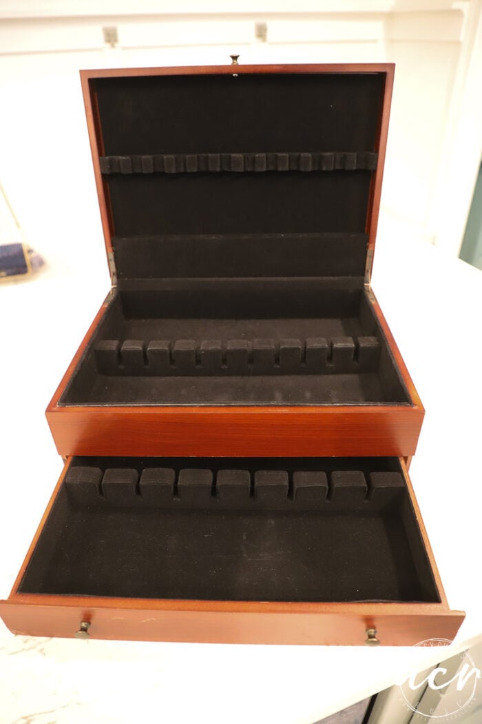 black felt interior of flatware box