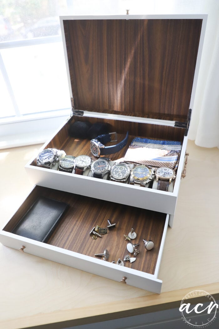 flatware box open with watches, cuff links etc., inside