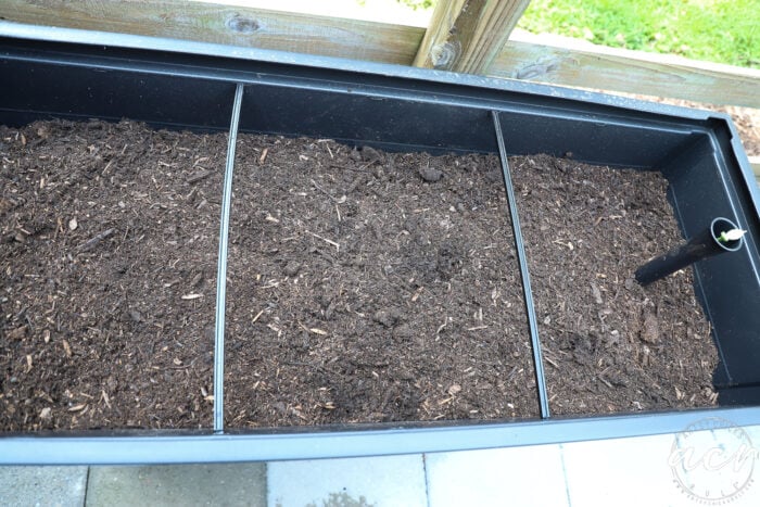 filled garden bed with potting mix