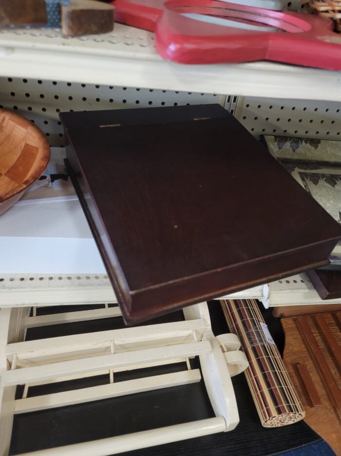 brown wood box on shelf