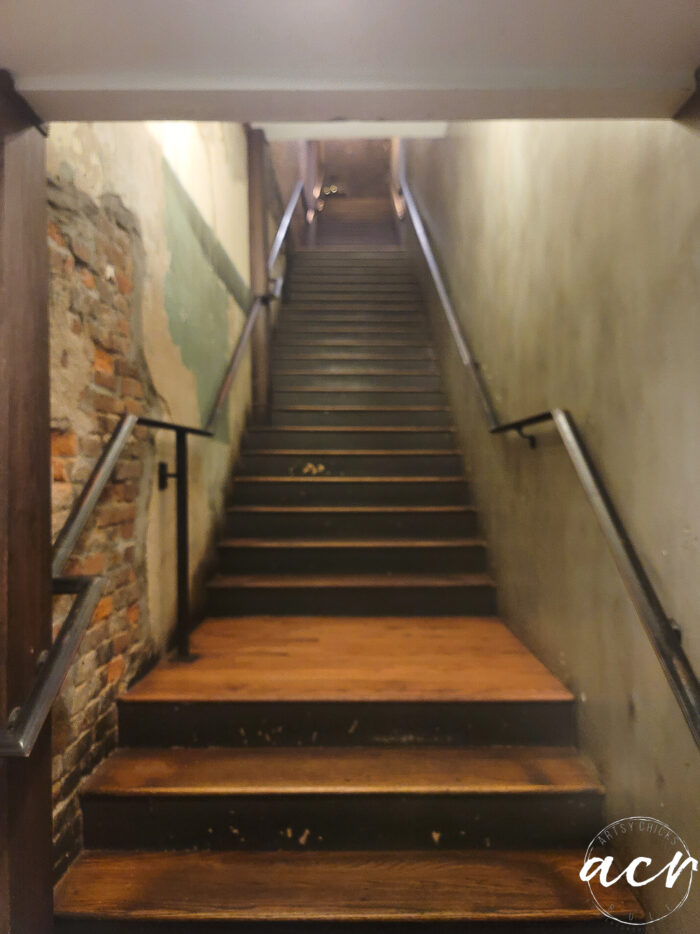 long row of wood stairs looking up