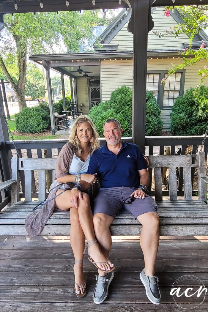 my husband and i on porch swing