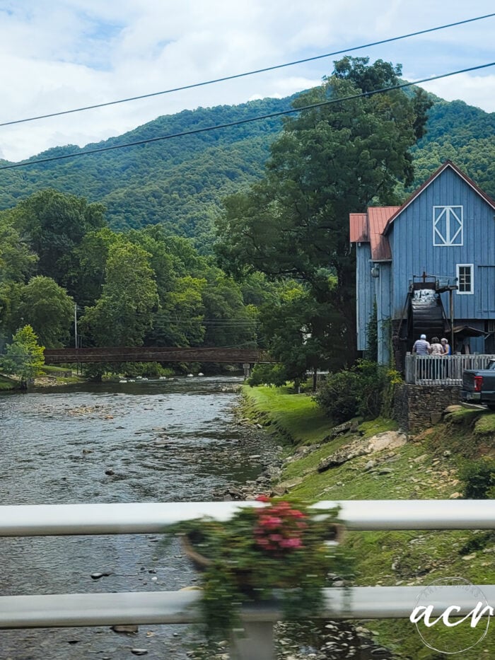 stream and blue barn